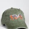 A green hat with an orange tail and a gray squirrel on it.