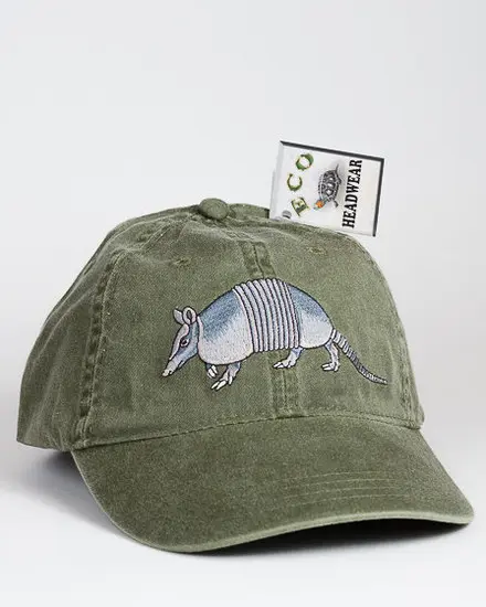 A baseball cap with an armadillo on it.