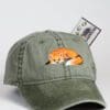 A green hat with an orange fox on it