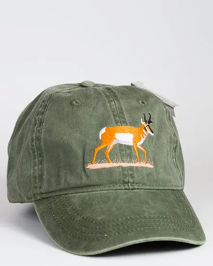 A green hat with an antelope on it.