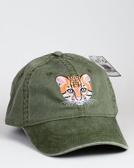 A green hat with an orange cat on it