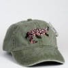 A green hat with a leopard print on it.