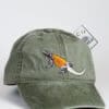 A baseball cap with an alligator on it.