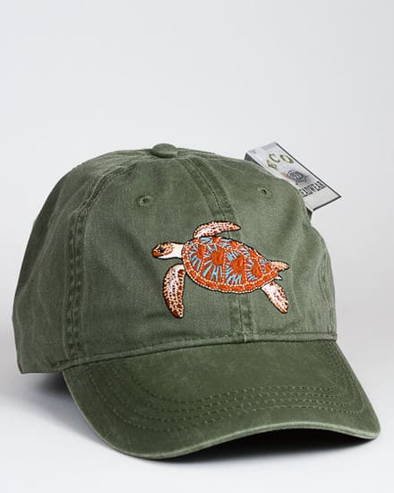 A Green Sea Turtle Cap with a turtle embroidered on it.