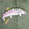 A fish is embroidered on the back of a hat.