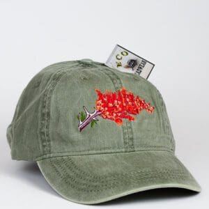 A green Ocotillo Cap with a red flower embroidered on it.