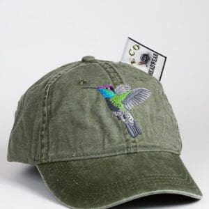 A green hat with a hummingbird on it.