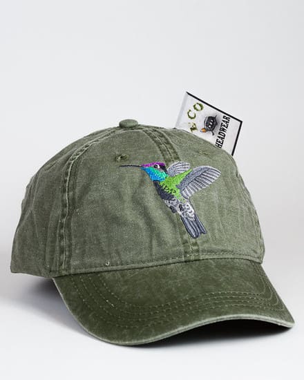 A green hat with a hummingbird on it.