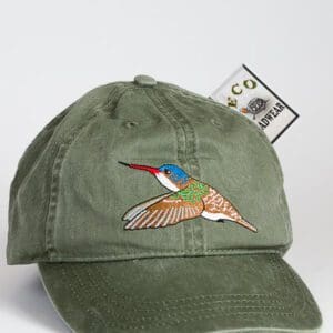 A green hat with a bird on it