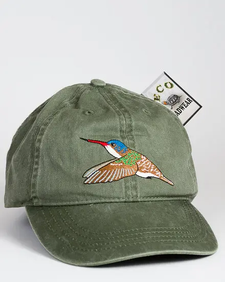A green hat with a bird on it