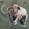 A close up of an elephant on the side of a hat
