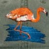 A flamingo is standing in the water.