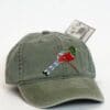 A green hat with a skier on it