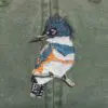 A close up of the bird on the jacket