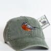 A green hat with an orange bird on it