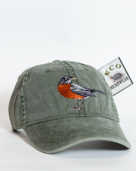 A green hat with an orange bird on it