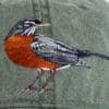 A bird with an antenna on its head.
