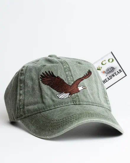 A hat with an eagle on it and a tag