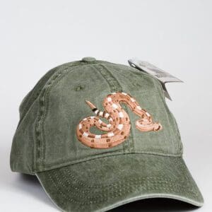 A Sidewinder Cap with a snake embroidered on it.