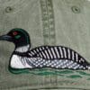 A hat with a duck on it
