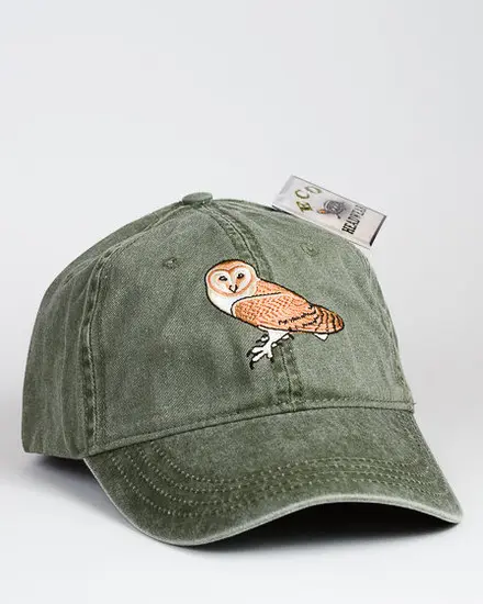 A baseball cap with an owl on it.