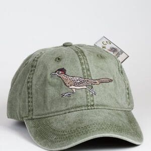 A green hat with a bird on it