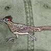 A close up of the bird on the hat