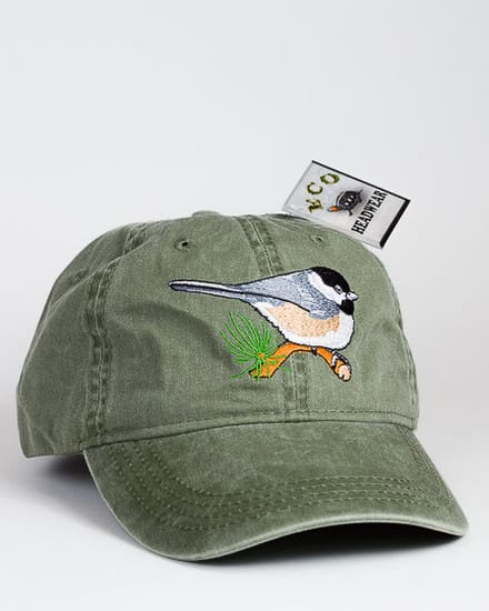 A green hat with a bird on it