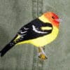 A bird is painted on the back of a jacket.
