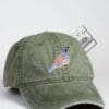 A green hat with a bird on it