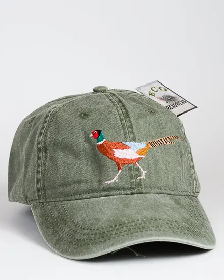 A green hat with an orange bird on it.