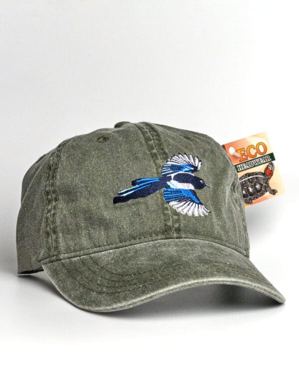 A Pileated Woodpecker Cap with a blue jay embroidered on it.