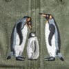 Two pileated woodpeckers are embroidered on a green baseball cap.
