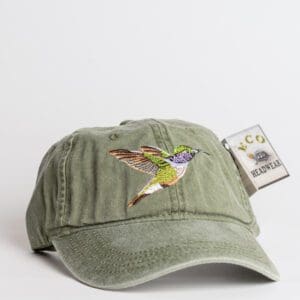 A hat with a bird on it is shown.