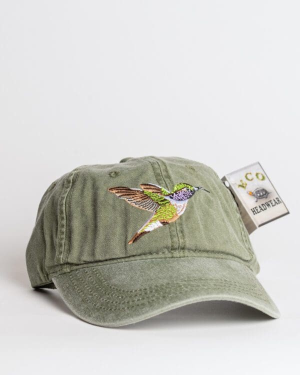 A hat with a bird on it is shown.