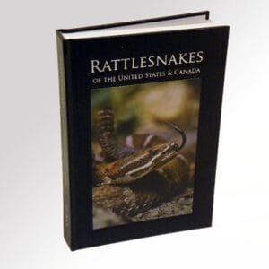 A book with an image of a snake on the cover.