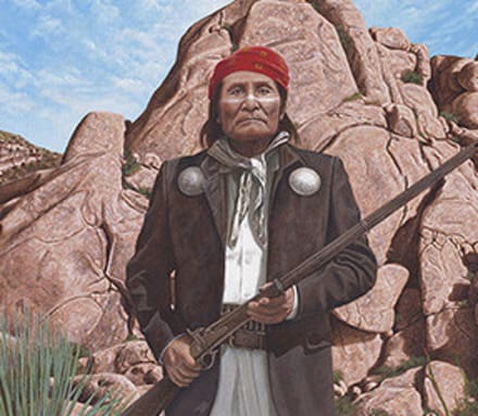 A painting of an indian with a rifle in front of a rock formation.