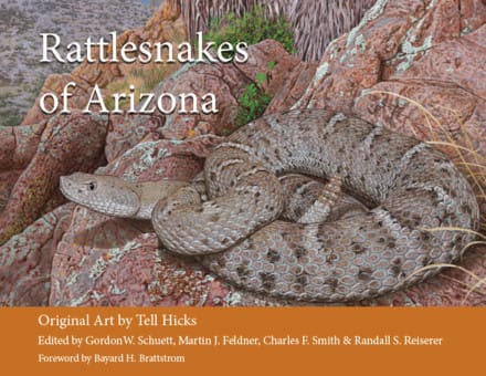 A book cover with a picture of rattlesnakes.