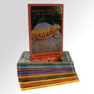 A stack of books with a picture of a turtle on the cover.