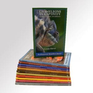 A stack of books with the cover of champions in captivity.