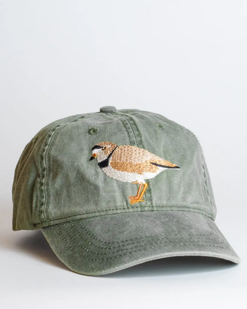 A hat with an image of a bird on it.