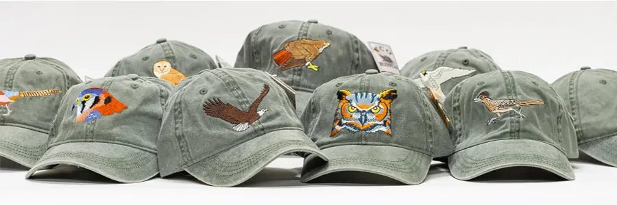 A group of hats with different designs on them.