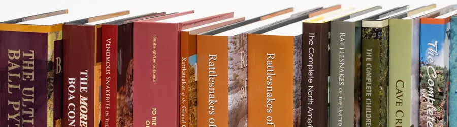 A close up of some books on rattlesnakes