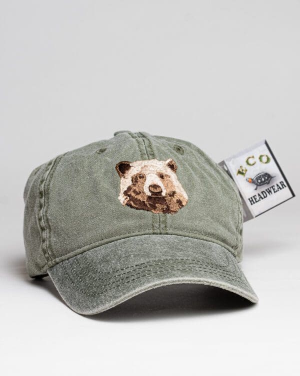 A hat with an image of a bear on it.