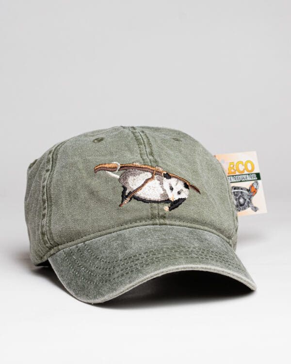 A baseball cap with an owl on it.