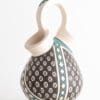 A vase with a pattern on it