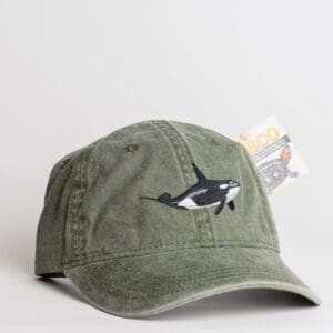A hat with an orca on it is shown.