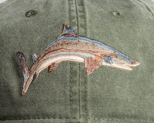 A close up of the fish on the hat