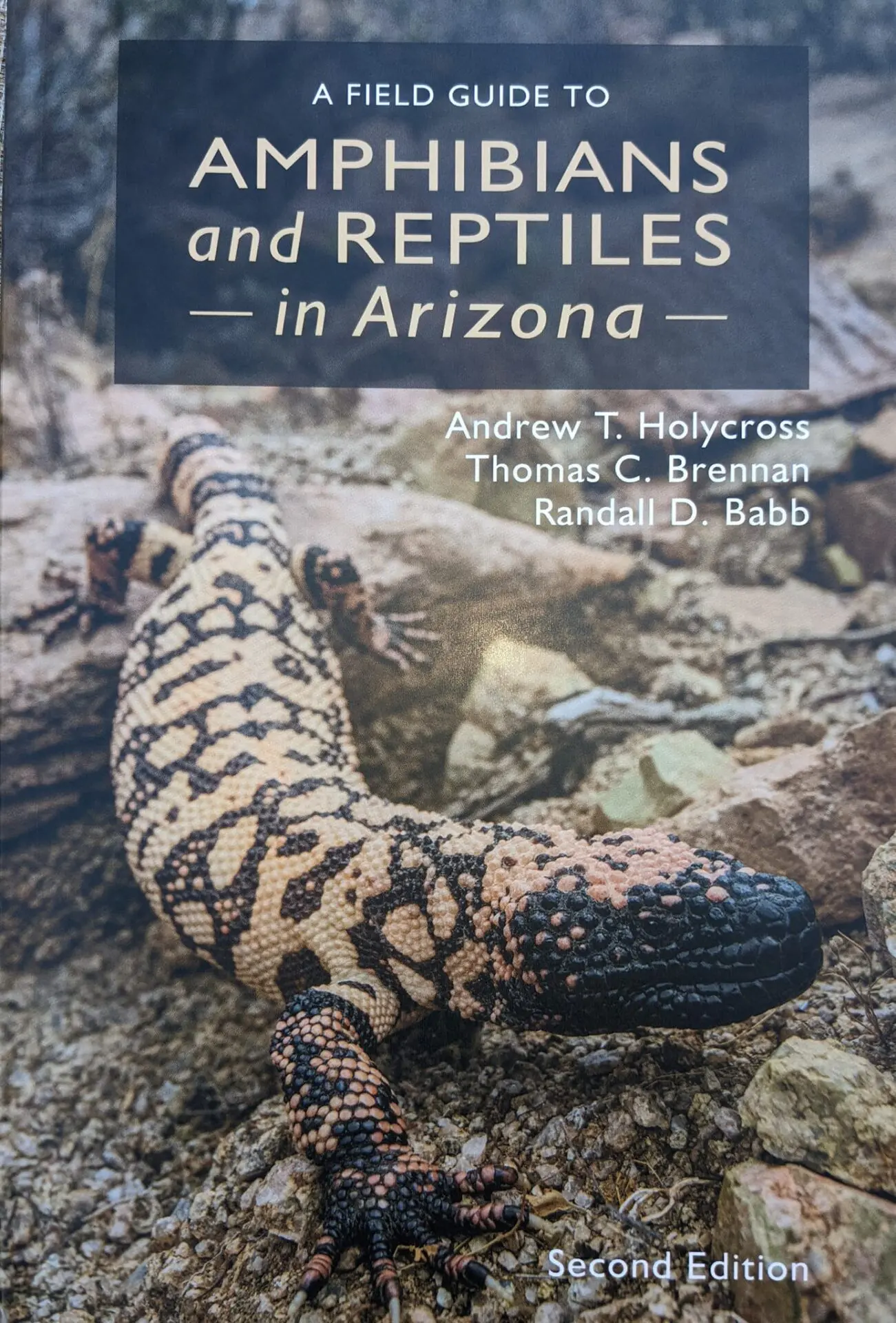 A book cover with an image of a lizard.