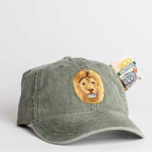 A green hat with an image of a lion on it.